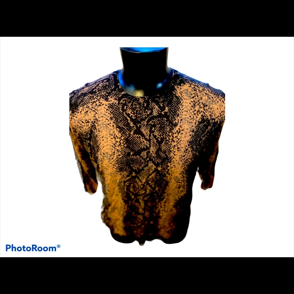 Snake print sweater in a warm mauve and black hues